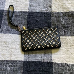 Black wristlet with gold studs